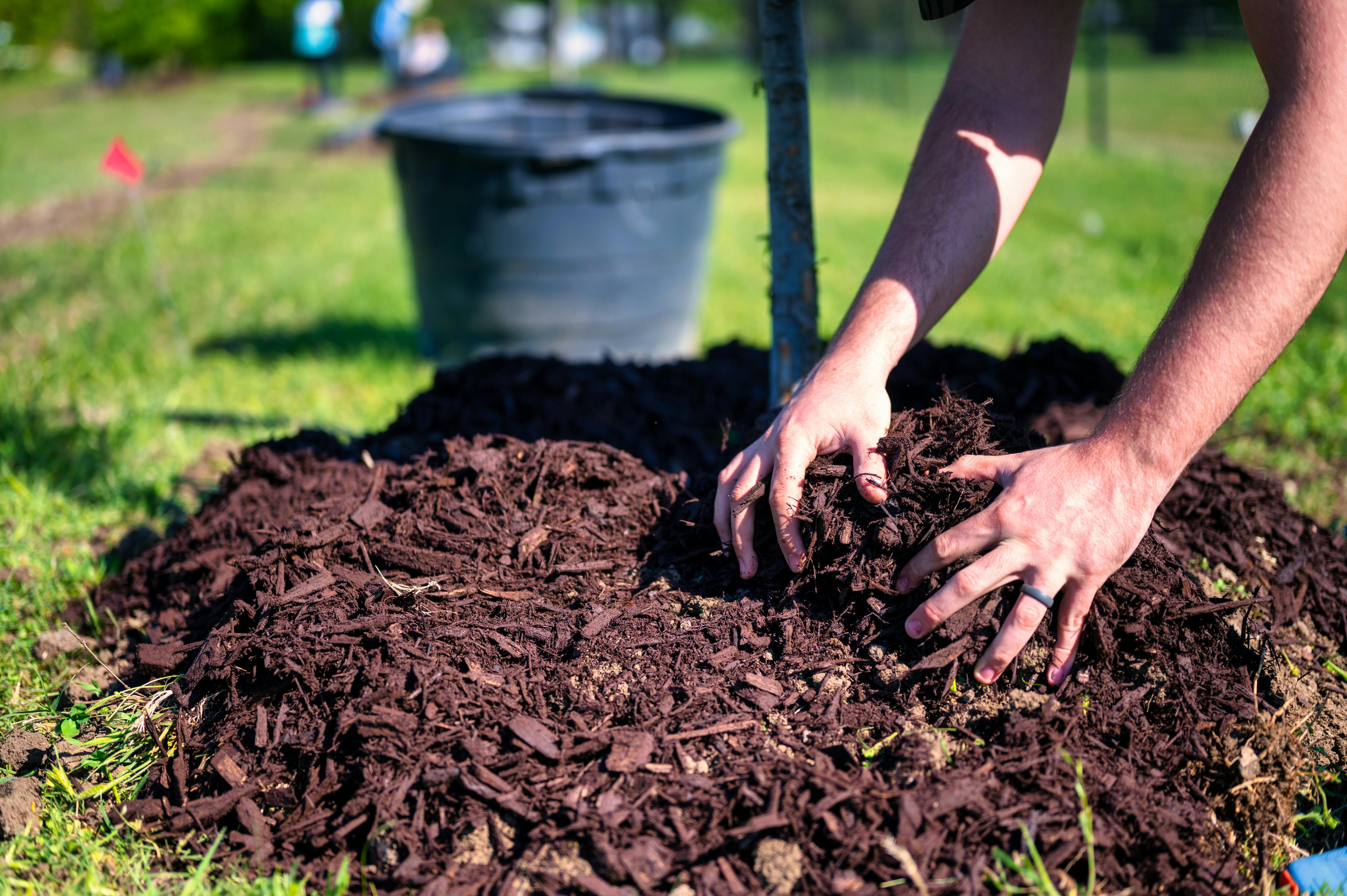 Mulch installation service for flower beds and landscape borders in Hartselle, AL